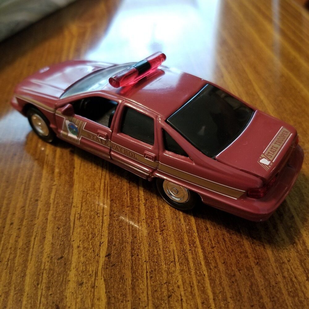 Minnesota State Police Road Champs die cast police car 1:43 scale
